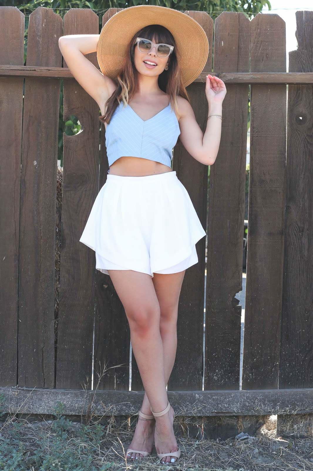 Stiletto Beats, los angeles blogger, field photoshoot, Los Angeles, shop akira, akira, white shorts, bow back top, urban outfitters straw hat, celine sunglasses,