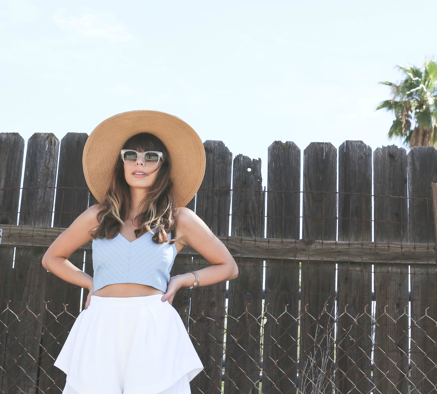 Stiletto Beats, los angeles blogger, field photoshoot, Los Angeles, shop akira, akira, white shorts, bow back top, urban outfitters straw hat, celine sunglasses,